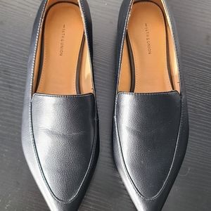 Black leather flats